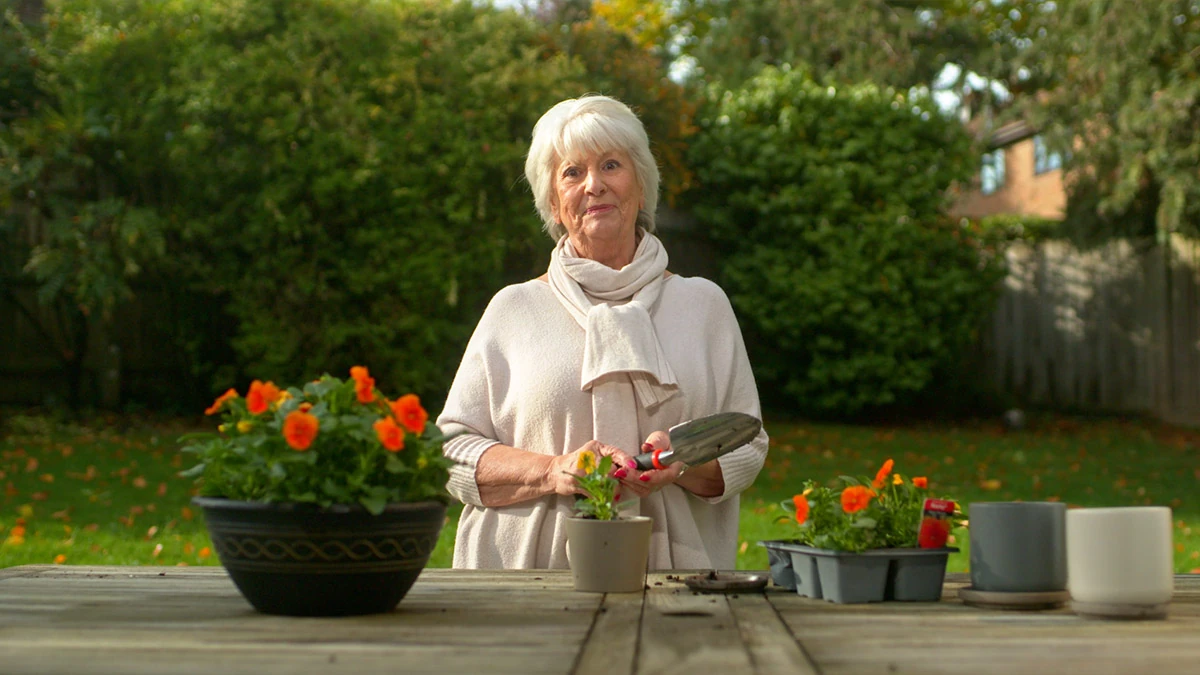 Simplicity Cremations presenter speaking in a warm and reassuring setting
